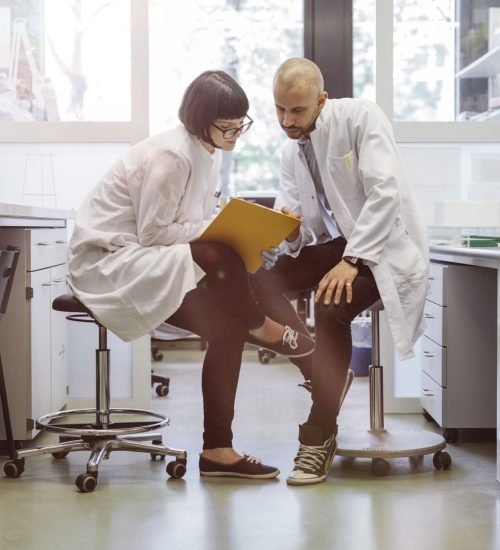 Scientists examining a specimen during archaeological research