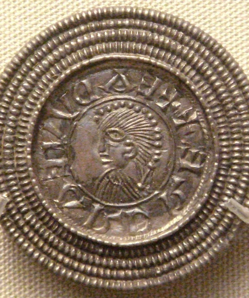 Historical Anglo-Saxon coin with detailed engraved design