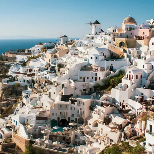 Whitewashed Greek coastal village overlooking the sea